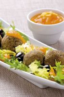 Chickpeasballs with Olives and Aromatic Carrots Sauce