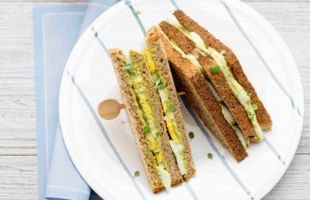 Whole Wheat Club Sandwich with Eggs and Avocado Hummus