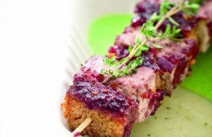 Tofu Skewer with Red Wine on Peas and Potatoes Velvety